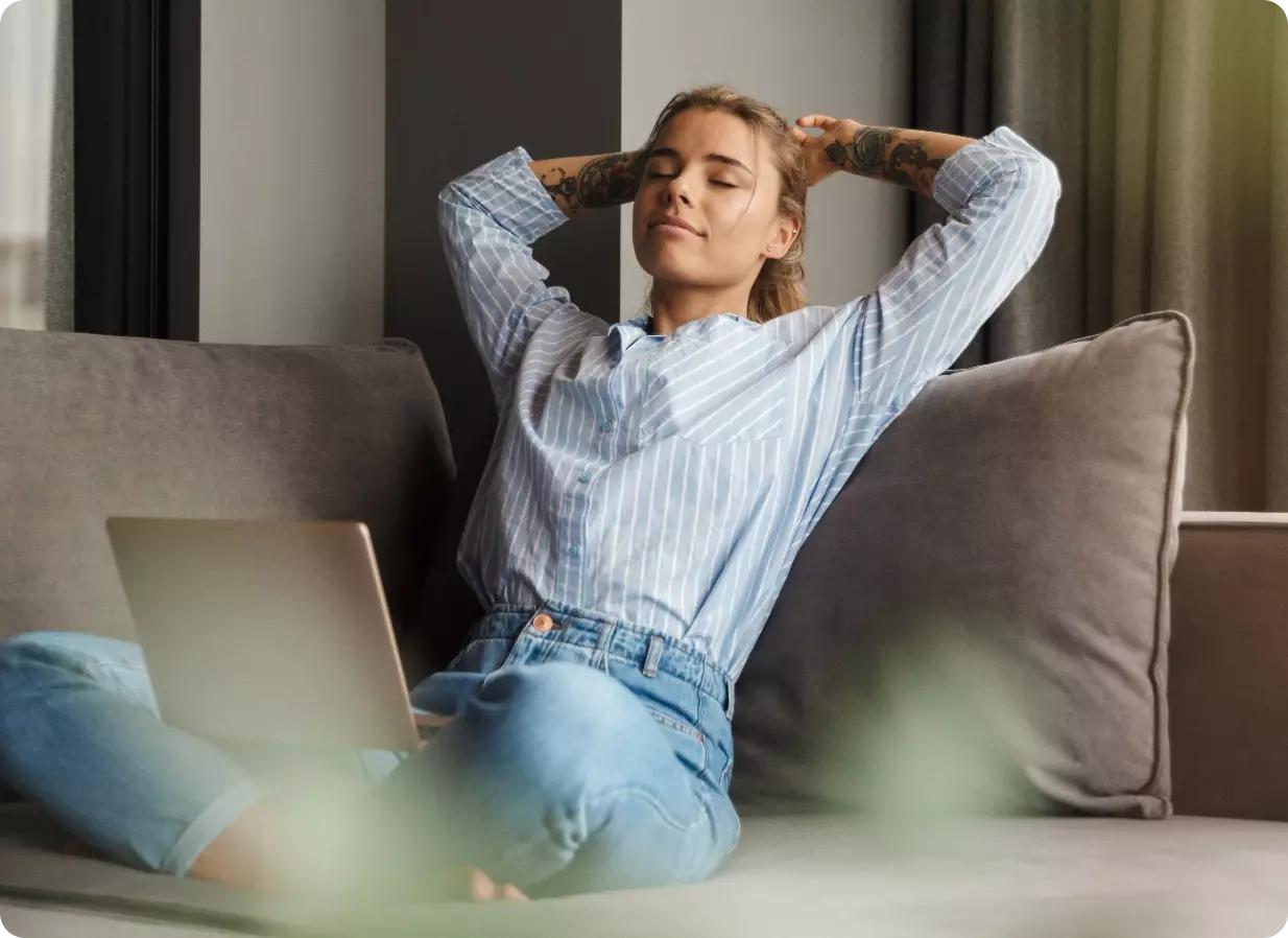 women stretching on a couch